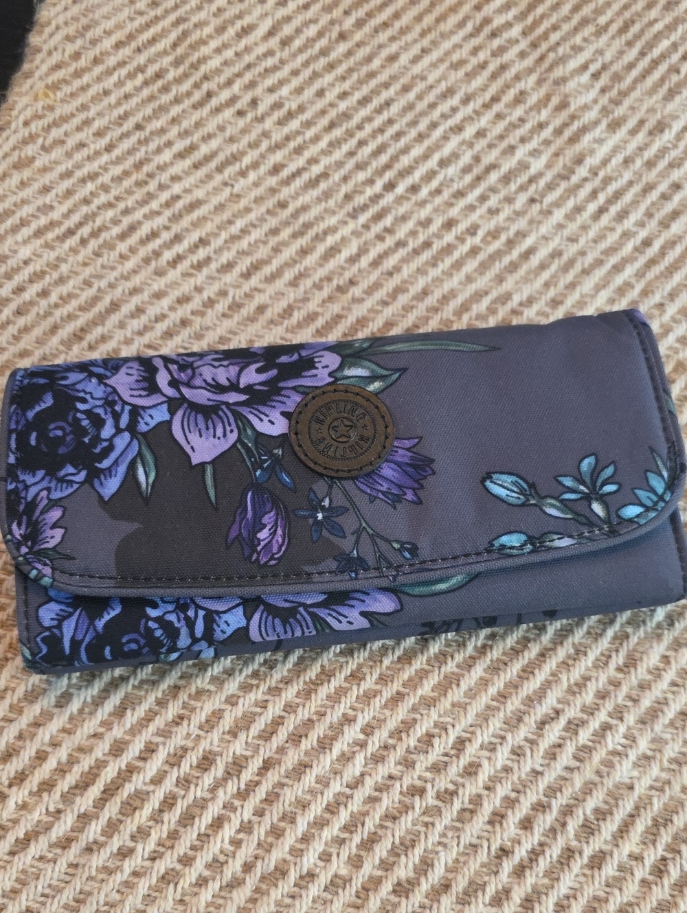 Kipling Money Land Snap Wallet featuring a grey-purple floral print